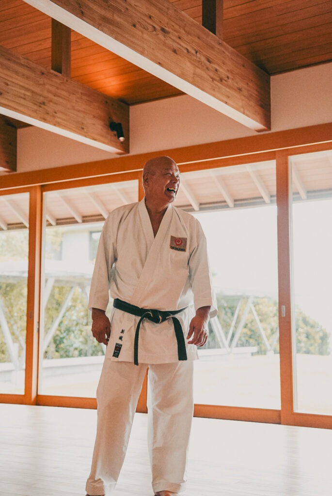 Guest wearing traditional Ryukyu attire at Hoshinoya Okinawa resort