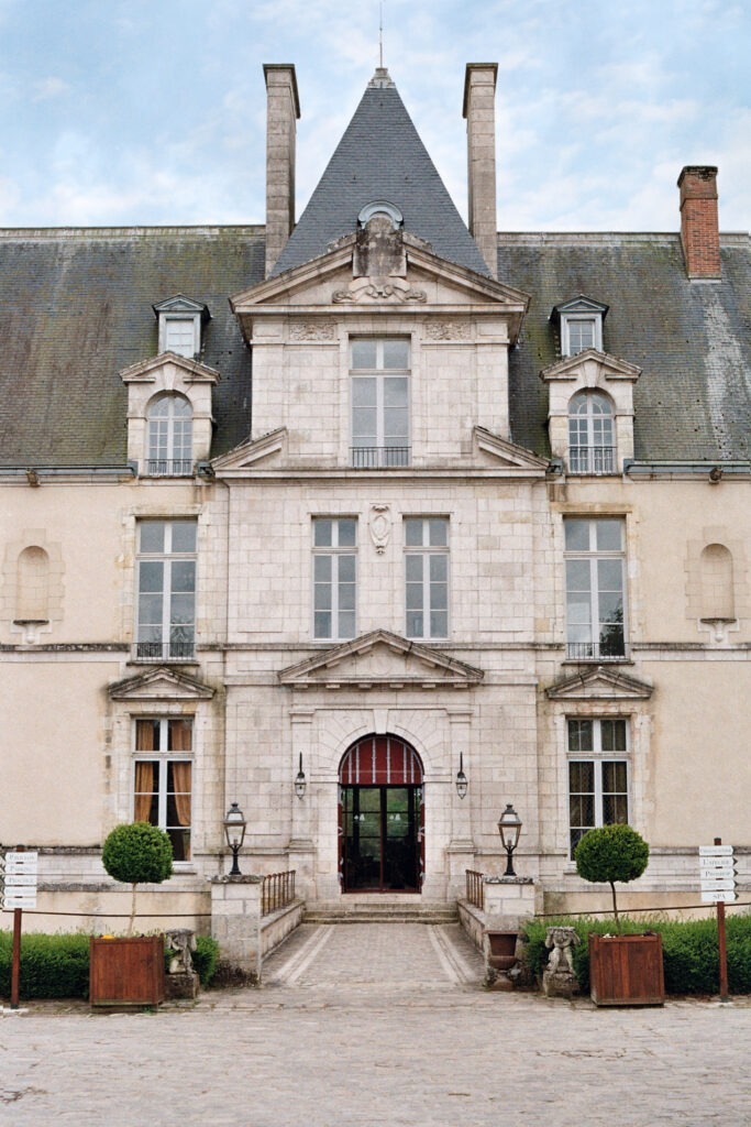 Main entrance of Château d'Augerville, a historic luxury hotel in France