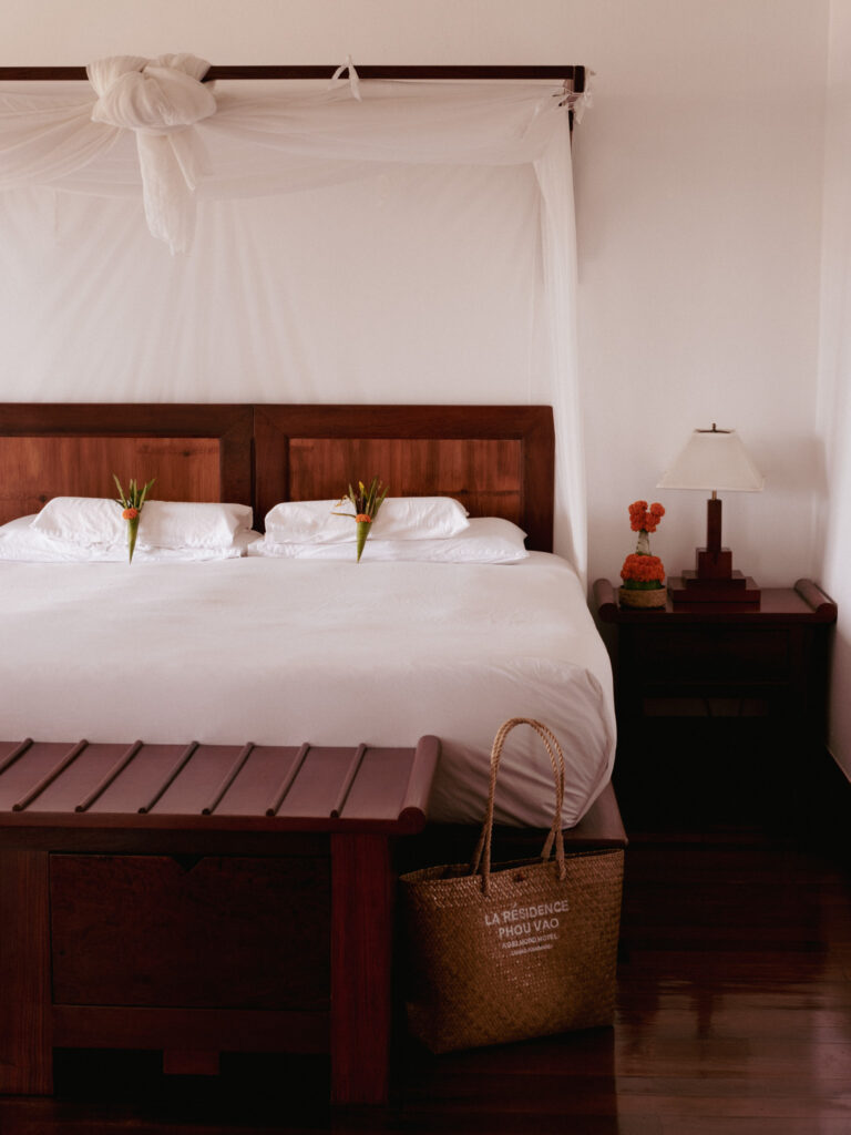 Cozy bedroom interior with neutral tones at Belmond La Résidence Phou Vao