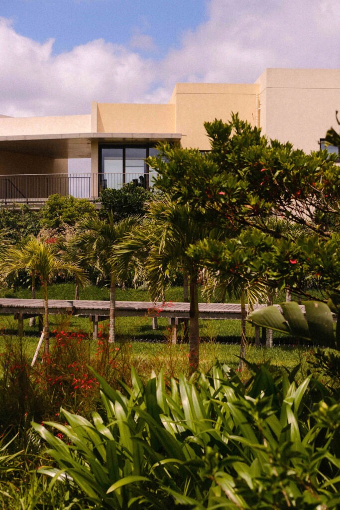 Hoshinoya Okinawa resort exterior surrounded by lush green gardens